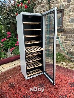 Bosch Wine Cooler. Tinted glass door and Oak Shelves. Holds up to 120 bottles