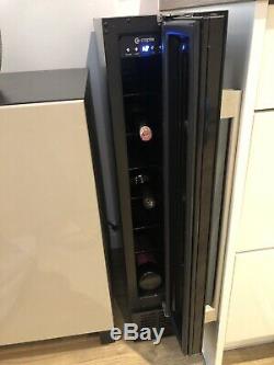 Wine cooler used only owner 6 bottles capacity + 1. Bought new from Currys PC